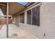 Covered patio with stone textured exterior walls at 15853 N 74Th Ave, Peoria, AZ 85382