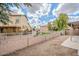 Backyard with gravel landscaping and block fence at 15853 N 74Th Ave, Peoria, AZ 85382