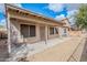 A covered patio in backyard with gravel landscaping and block fence at 15853 N 74Th Ave, Peoria, AZ 85382