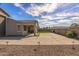 A view of the covered patio and large backyard at 1627 E Walter Dr, Casa Grande, AZ 85122