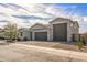 Charming single-story home with a three-car garage and a desert-landscaped front yard at 1627 E Walter Dr, Casa Grande, AZ 85122