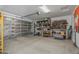 A well-organized garage with plenty of room for tools, storage, and a work area at 1627 E Walter Dr, Casa Grande, AZ 85122