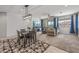 Open concept living room with lots of space, recessed lighting, and large windows at 1627 E Walter Dr, Casa Grande, AZ 85122