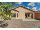 Spacious backyard featuring a patio and neutral gravel at 17125 W Saguaro Ln, Surprise, AZ 85388