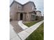 Charming two-story home with a neutral exterior, a curved entrance, and landscaped front yard at 1717 W Pollack St, Phoenix, AZ 85041