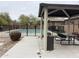 A community pool area featuring a covered picnic area, a gated pool, and a clean, well-maintained environment at 1717 W Pollack St, Phoenix, AZ 85041