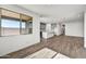 Spacious living area flows into a modern kitchen, creating an open and inviting space at 17216 W Sunward Dr, Goodyear, AZ 85338