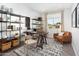 Bright home office with sleek shelving, comfortable seating, and inspiring natural light for productive work at 17216 W Sunward Dr, Goodyear, AZ 85338