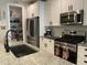 Kitchen with stainless appliances, granite countertop and view of the walk-in pantry at 19864 W San Juan Ave, Litchfield Park, AZ 85340