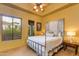 Comfortable bedroom featuring natural light, neutral tones, and a cozy window, creating a peaceful retreat at 2005 N Pomelo --, Mesa, AZ 85215