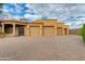 Spacious three car garage with large driveway and mature landscaping at 2005 N Pomelo --, Mesa, AZ 85215