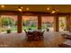 Outdoor seating area with ceiling fans overlooking the backyard at 2005 N Pomelo --, Mesa, AZ 85215