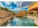 Resort-style pool area with a spa, water feature and lush landscaping for a private retreat at 2005 N Pomelo --, Mesa, AZ 85215