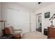 Neutral bedroom features a large closet and updated lighting at 2116 S Moccasin Trl, Gilbert, AZ 85295