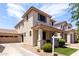 Lovely home with a spacious driveway leading to a two-car garage and an inviting porch at 2116 S Moccasin Trl, Gilbert, AZ 85295