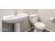 Bathroom featuring a pedestal sink and a toilet at 22125 N 29Th Ave # 158, Phoenix, AZ 85027