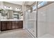 Bathroom boasting dual vanities and a large glass-enclosed shower with built-in seating at 22800 E Via Las Brisas Rd, Queen Creek, AZ 85142