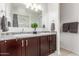 Bathroom with double sinks, granite countertops, modern fixtures and vanity with ample cabinet space at 2426 E San Gabriel Trl, Casa Grande, AZ 85194