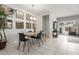 Inviting dining area with a contemporary table, elegant lighting, and stylish decor at 2426 E San Gabriel Trl, Casa Grande, AZ 85194