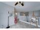 Upper loft area with tile flooring, neutral paint, and natural light creates a versatile space for relaxation or hobbies at 2501 N 114Th Ave, Avondale, AZ 85392