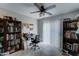 Well-lit office with tile flooring, shelving, and an organized workspace to enhance productivity and comfort at 2501 N 114Th Ave, Avondale, AZ 85392