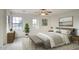 Bedroom with neutral tones, decorative rug and a large picture window at 2868 E Clifton Ct, Gilbert, AZ 85295