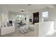 Comfortable living room with a fireplace, built-in shelving, and many windows for natural light at 2868 E Clifton Ct, Gilbert, AZ 85295