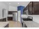 Well-equipped kitchen featuring stainless steel appliances, modern countertops, and ample cabinet space at 2882 E Indian Wells Pl, Chandler, AZ 85249