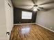 Bedroom with wood floors, neutral paint, ceiling fan, and closet at 30 E Brown Rd # 2052, Mesa, AZ 85201