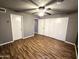 Bedroom with wood floors, neutral paint, ceiling fan, and closet at 30 E Brown Rd # 2052, Mesa, AZ 85201