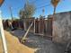 Backyard with partial fencing awaiting renovation, creating a sense of privacy at 3211 W Bethany Home Rd, Phoenix, AZ 85017