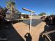 Large backyard area with a trampoline, covered space and shade trees creating an inviting outdoor space at 3211 W Bethany Home Rd, Phoenix, AZ 85017