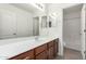 Bathroom features double mirrors, white countertops, and a view into the shower and toilet area at 3507 E Erie St, Gilbert, AZ 85295