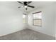 Bedroom with neutral carpet, natural lighting, and an inviting atmosphere at 3507 E Erie St, Gilbert, AZ 85295