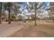 Community park featuring mature shade trees, grassy areas, and playground, providing a relaxing outdoor space at 3542 E Pala Ct, Gilbert, AZ 85297