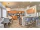 Modern kitchen with granite countertops, stainless steel appliances, and a breakfast bar for casual dining at 3542 E Pala Ct, Gilbert, AZ 85297