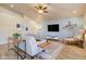 Stylish living room showcasing modern furnishings, neutral color scheme, and a comfortable layout at 3542 E Pala Ct, Gilbert, AZ 85297