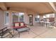 Comfortable covered patio with cozy seating and outdoor dining space at 3542 E Pala Ct, Gilbert, AZ 85297