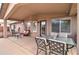 Spacious covered patio with ample seating, ideal for outdoor entertaining at 3542 E Pala Ct, Gilbert, AZ 85297