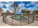 Backyard pool featuring rock accents and serene, Gathering-friendly design at 3542 E Pala Ct, Gilbert, AZ 85297