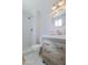 Modern bathroom showcasing a vanity with stone countertop and a subway tile shower at 3619 E Friess Dr, Phoenix, AZ 85032