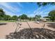 Community playground includes swing sets, slides, and a covered picnic area for Gathering enjoyment at 493 E Baylor Ln, Gilbert, AZ 85296