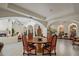 Grand foyer featuring high ceilings, arched doorways, and custom woodwork at 5254 E Arroyo Rd, Paradise Valley, AZ 85253