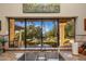 Kitchen sink with a view of the lush backyard, custom countertops, and modern fixtures at 5254 E Arroyo Rd, Paradise Valley, AZ 85253