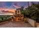 Inviting outdoor fireplace with a seating area, perfect for enjoying the evening sunset at 5254 E Arroyo Rd, Paradise Valley, AZ 85253