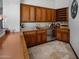 A charming wet bar featuring wooden cabinets, a wine rack, and a built-in beverage cooler at 5254 E Arroyo Rd, Paradise Valley, AZ 85253