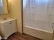 Bathroom featuring a standard white sink vanity and a tub with shower featuring a white shower curtain at 549 E Mckellips Rd # 55, Mesa, AZ 85203