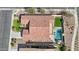 Aerial view of the property showcasing the tile roof, pool, patio, and well-maintained landscaping at 5779 S Penrose Dr, Gilbert, AZ 85298