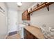 Functional laundry room with cabinets, countertop space, and washer/dryer at 5779 S Penrose Dr, Gilbert, AZ 85298