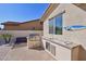 Outdoor kitchen and counter with stainless steel BBQ and sink at 5779 S Penrose Dr, Gilbert, AZ 85298